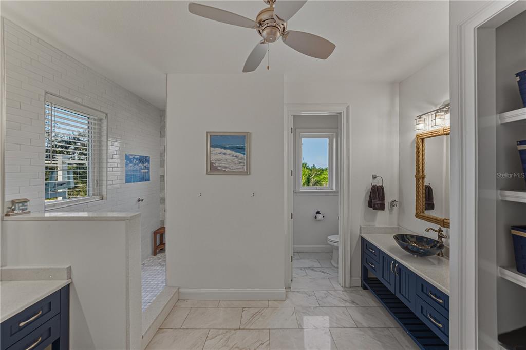 125 Burns Road Terra Ceia, FL 34250 - Photo 31 of 90 a kitchen with cabinets and window