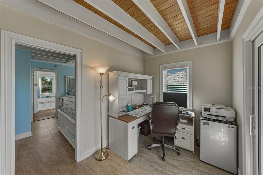 125 Burns Road Terra Ceia, FL 34250 - Photo 38 of 90 a view of a workspace with furniture and a window