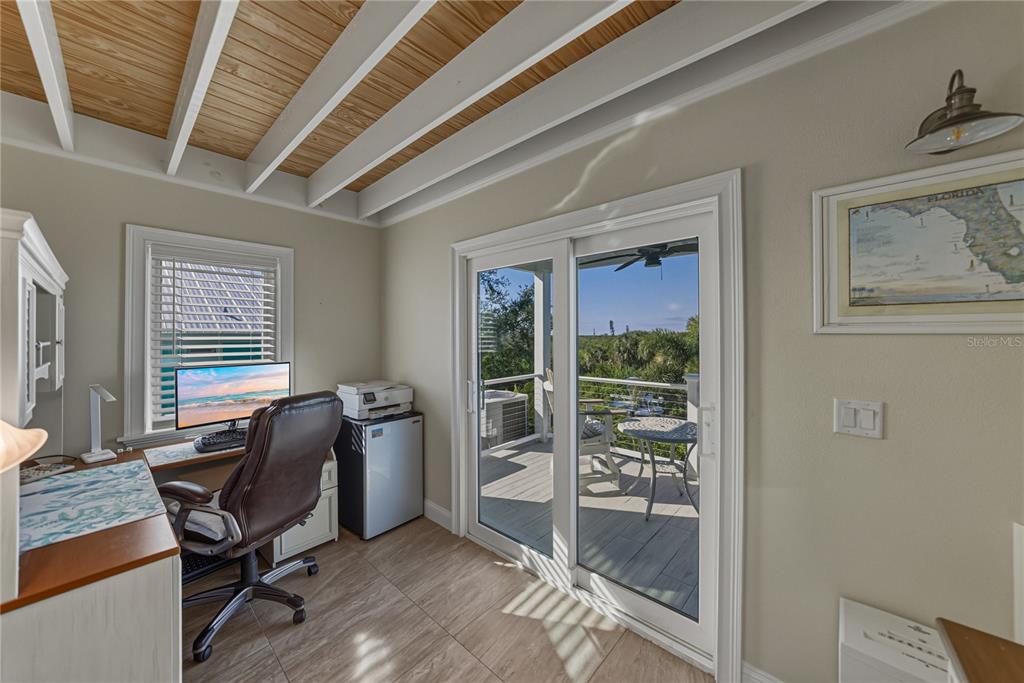 125 Burns Road Terra Ceia, FL 34250 - Photo 39 of 90 a view of a livingroom with workspace and a window