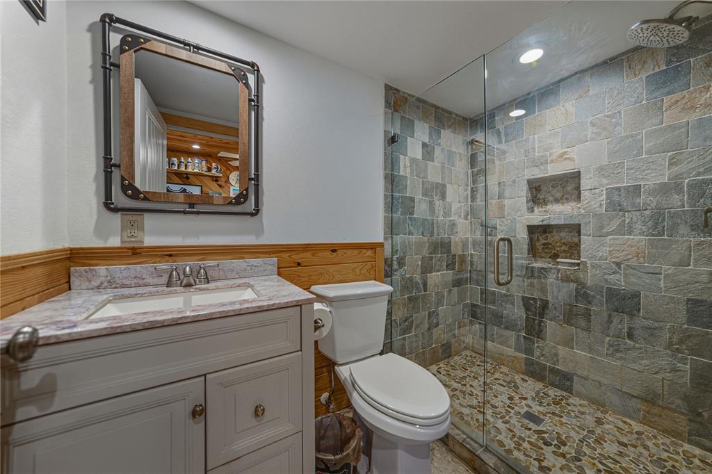 125 Burns Road Terra Ceia, FL 34250 - Photo 46 of 90 a bathroom with a sink toilet and shower