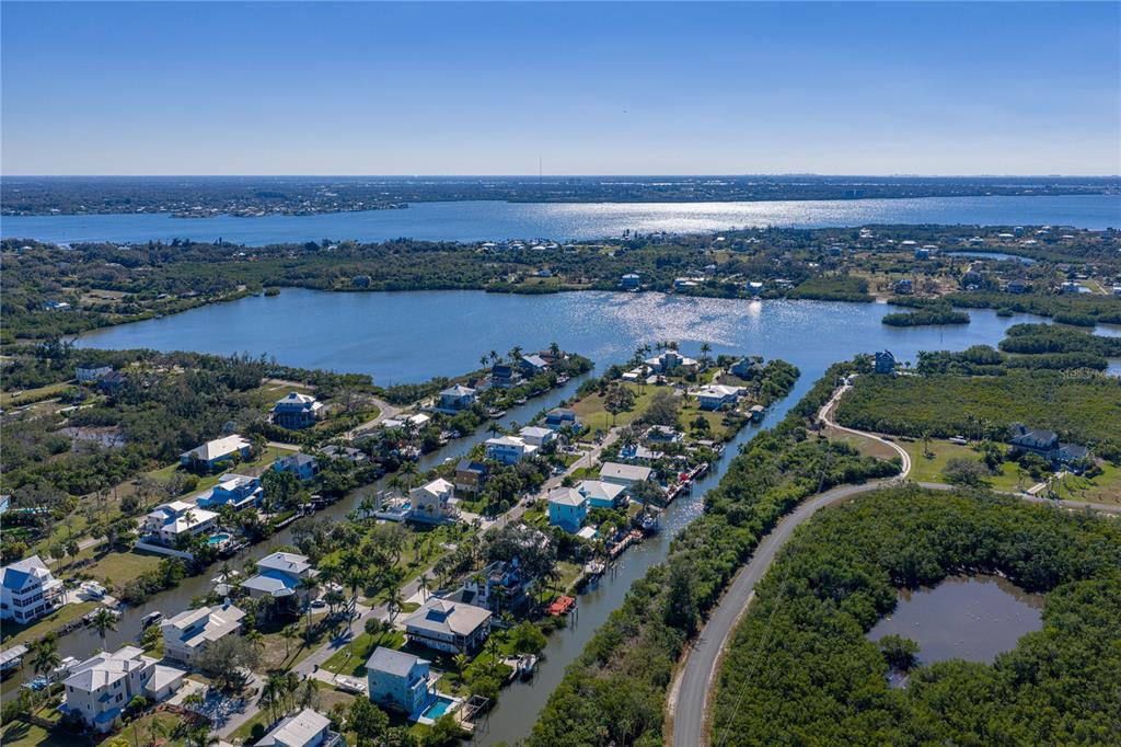 125 Burns Road Terra Ceia, FL 34250 - Photo 68 of 90 an aerial view of a city and lake view