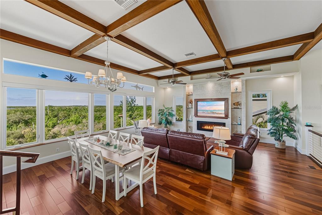125 Burns Road Terra Ceia, FL 34250 - Photo 9 of 90 a living room with furniture and a large window