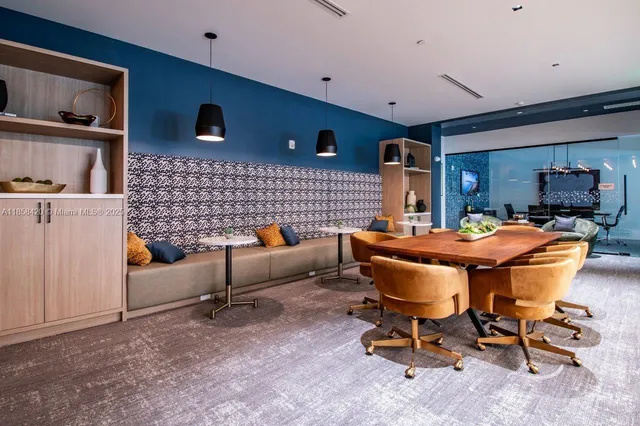 a view of a workspace with furniture