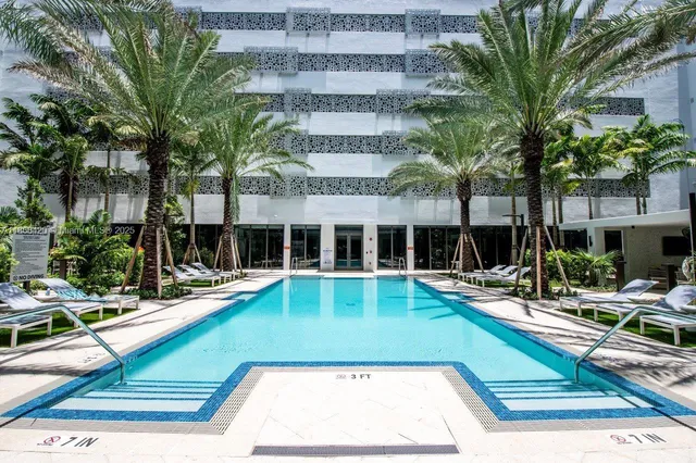 a view of an chair and tables in the patio