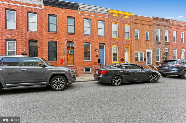 a car parked in front of a building