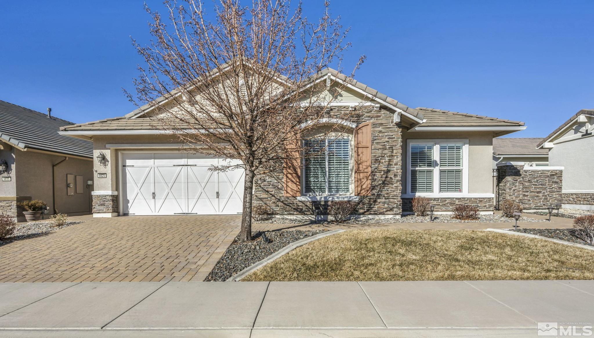 9825 Hafflinger Lane Reno, NV 89521 - Photo 1 of 39 a view of a house with a outdoor space