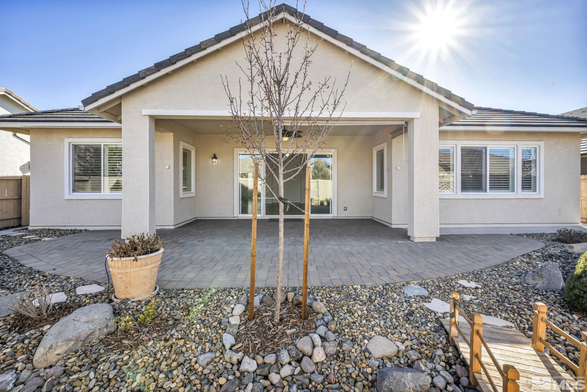 9825 Hafflinger Lane Reno, NV 89521 - Photo 30 of 39 a view of a house with a patio