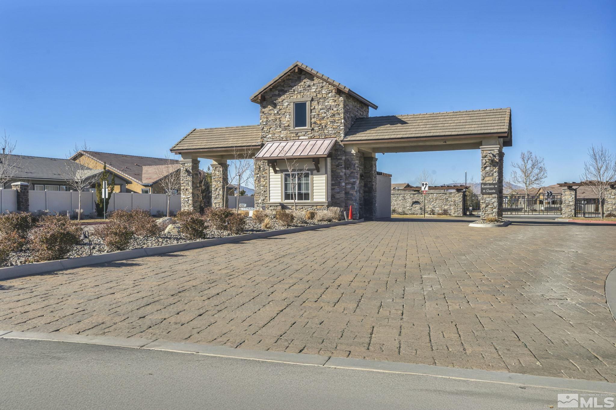 9825 Hafflinger Lane Reno, NV 89521 - Photo 39 of 39 a front view of a house with a yard