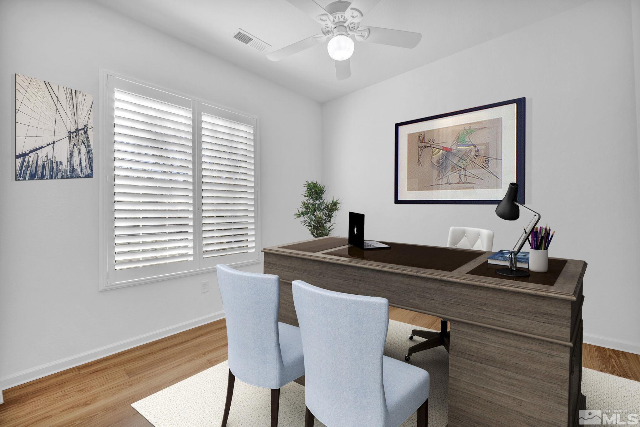 9825 Hafflinger Lane Reno, NV 89521 - Photo 4 of 39 a table and chairs in a room