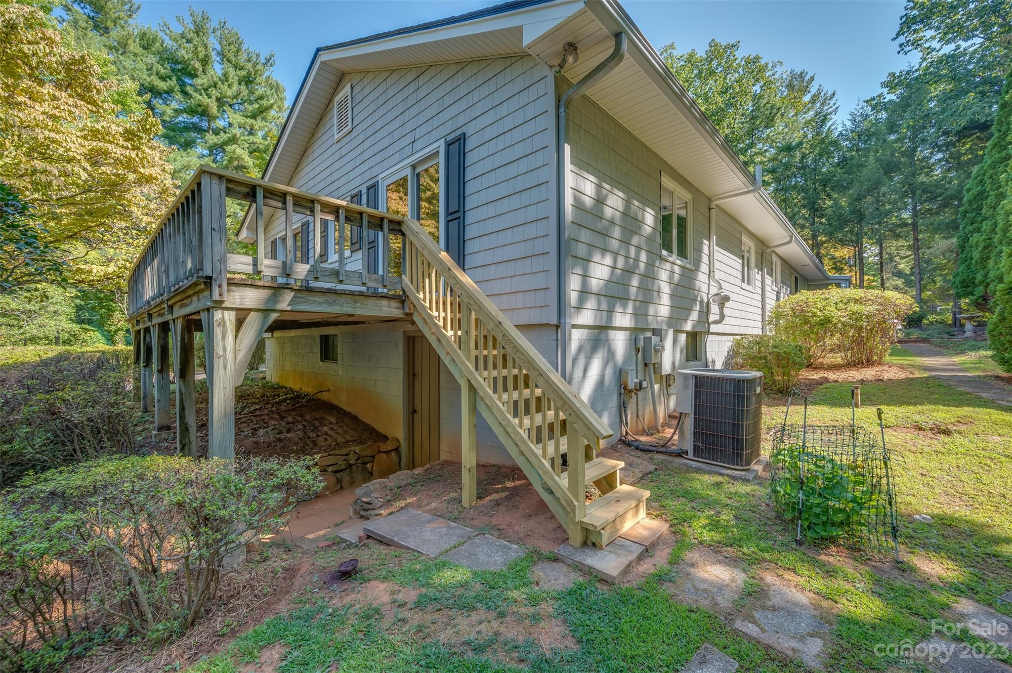 269 Golden Road Tryon, NC 28782 - Photo 7 of 43 a view of a house with a yard