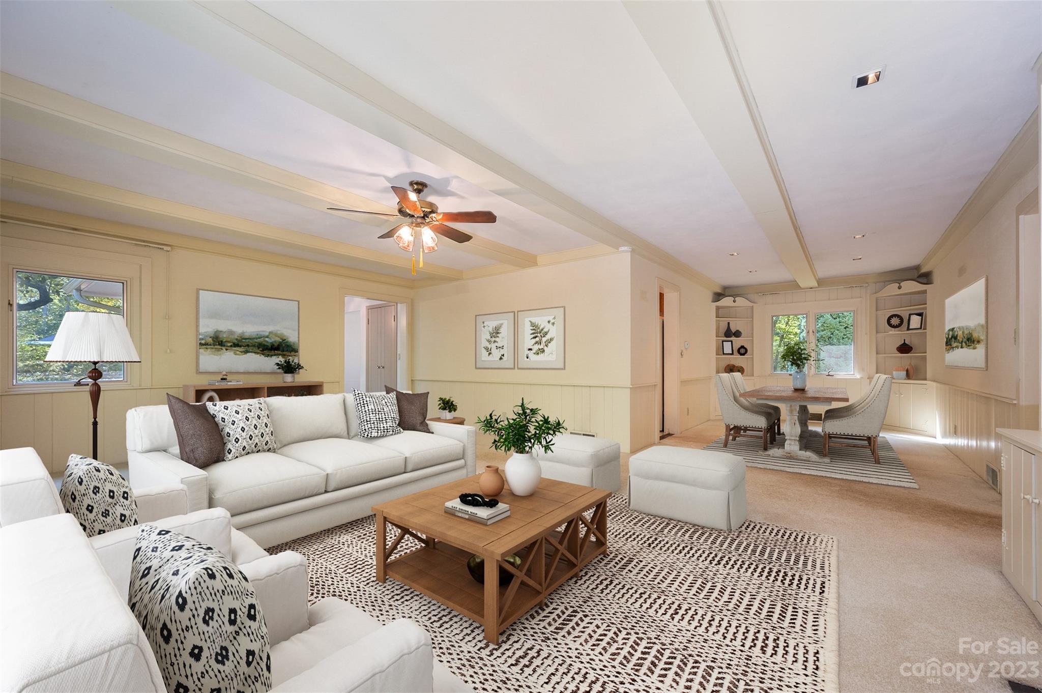 269 Golden Road Tryon, NC 28782 - Photo 8 of 43 a living room with furniture a rug and a chandelier