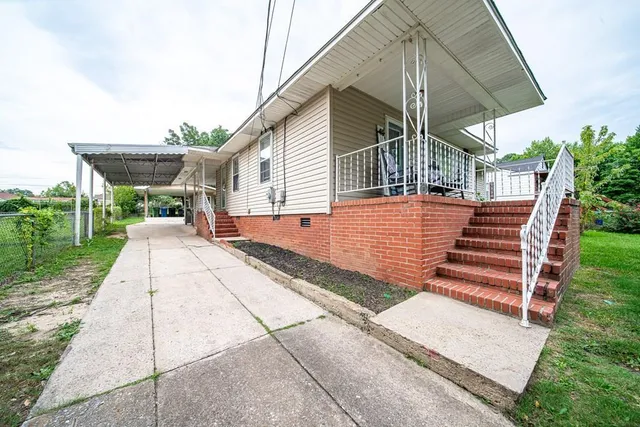 a backyard of a house with lots of green space