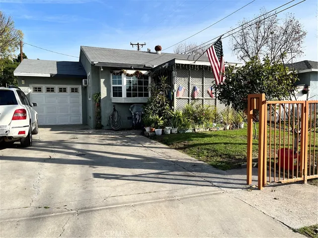 a house view with a garden space