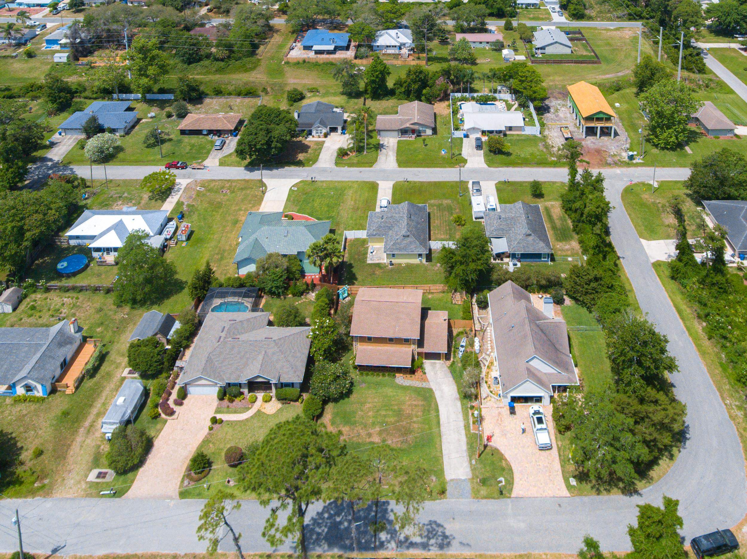 110 Harvard Road St. Augustine, FL 32086 - Photo 12 of 42 an aerial view of residential houses with outdoor space and parking