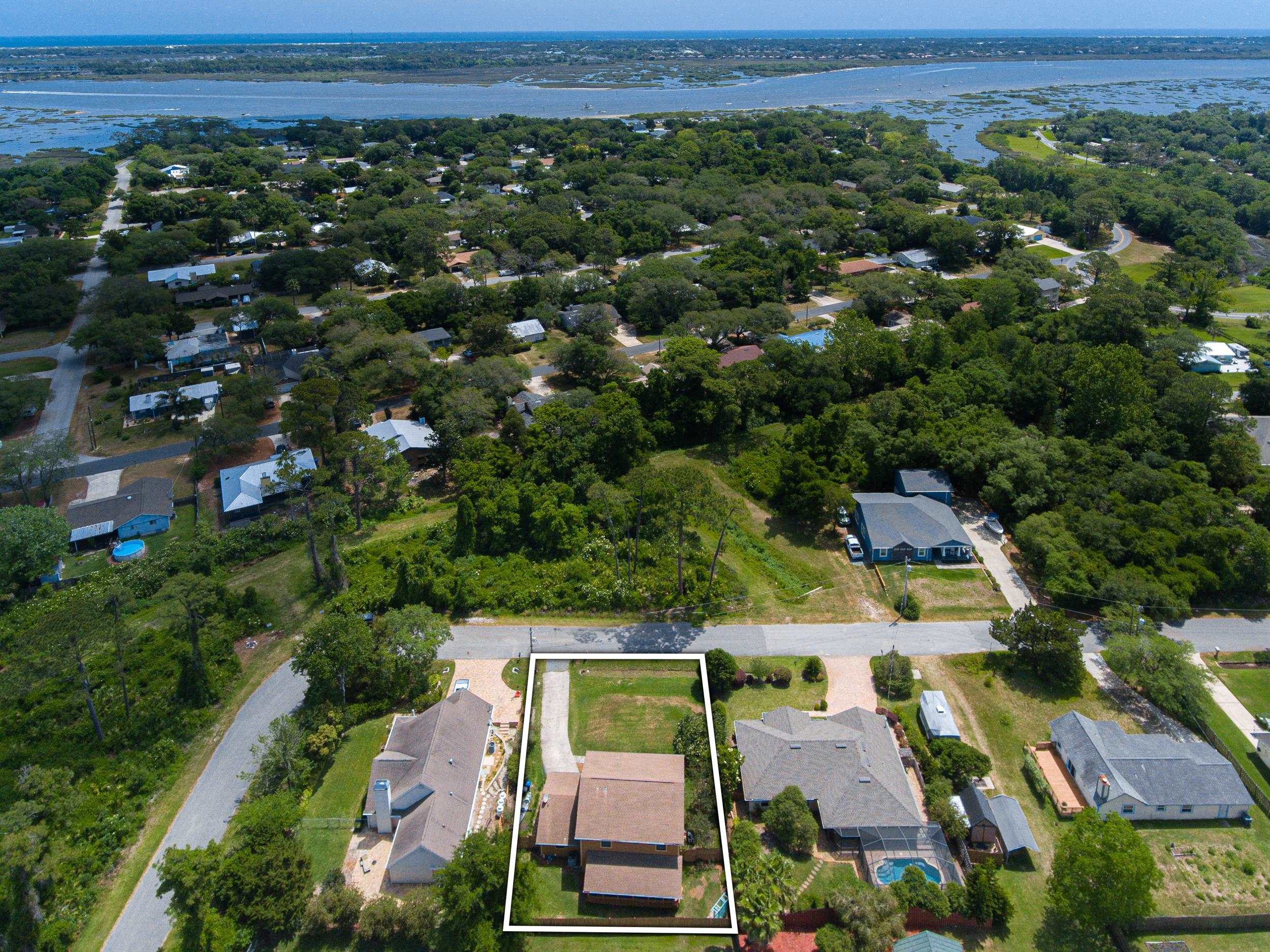 110 Harvard Road St. Augustine, FL 32086 - Photo 2 of 42 an aerial view of residential houses with outdoor space