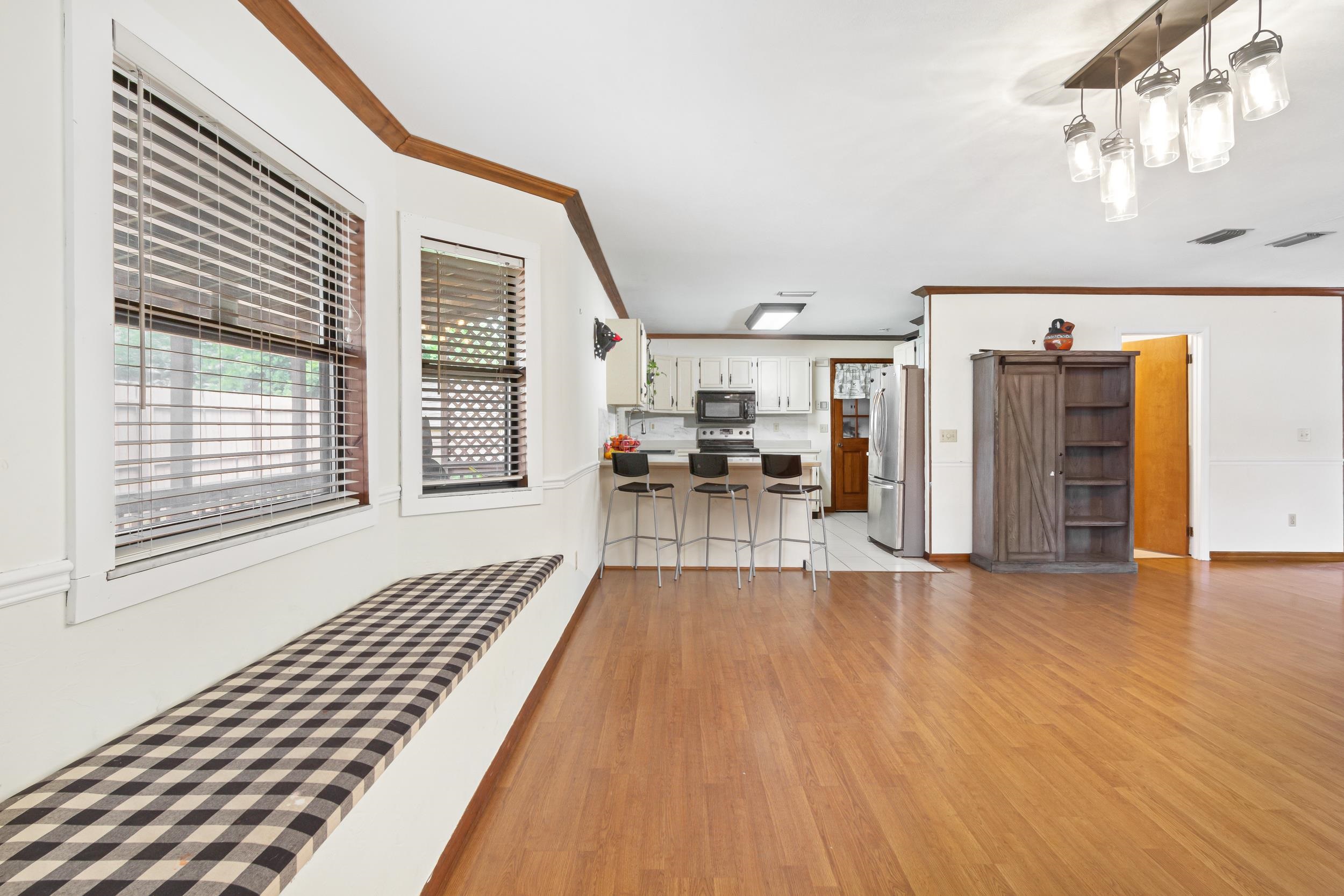 110 Harvard Road St. Augustine, FL 32086 - Photo 6 of 42 a view of a living room with a large window