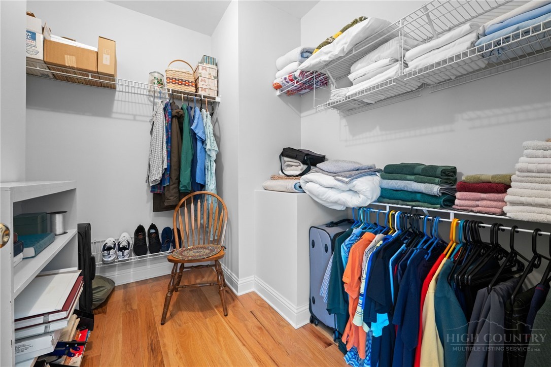 982 Brown's Chapel Road Boone, NC 28607 - Photo 15 of 42 a view of walk in closet with clothes and shoes