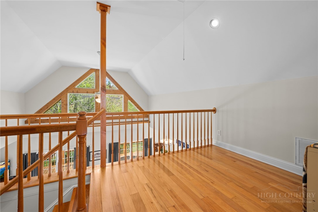 982 Brown's Chapel Road Boone, NC 28607 - Photo 21 of 42 a view of staircase with a floor to ceiling window