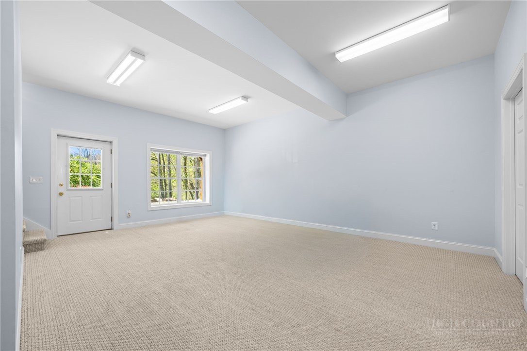 982 Brown's Chapel Road Boone, NC 28607 - Photo 29 of 42 an empty room with windows