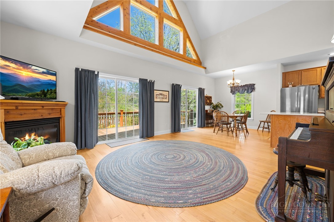 982 Brown's Chapel Road Boone, NC 28607 - Photo 3 of 42 a view of a livingroom with furniture window and wooden floor