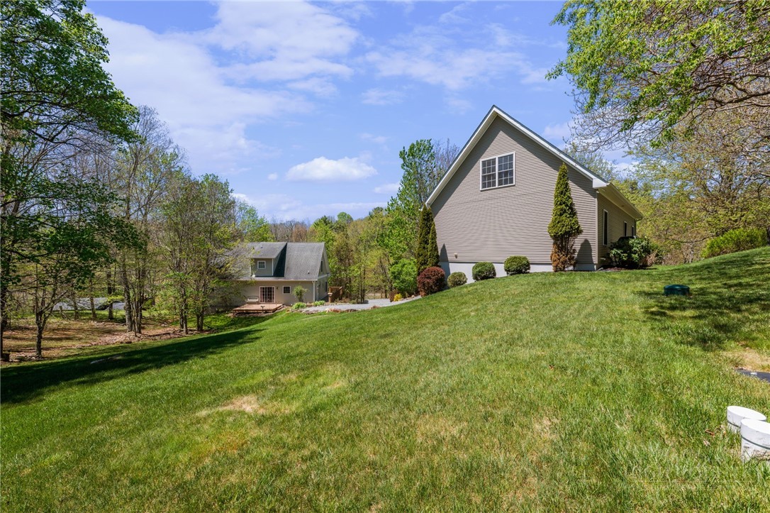 982 Brown's Chapel Road Boone, NC 28607 - Photo 38 of 42 a front view of house with yard and trees in the background