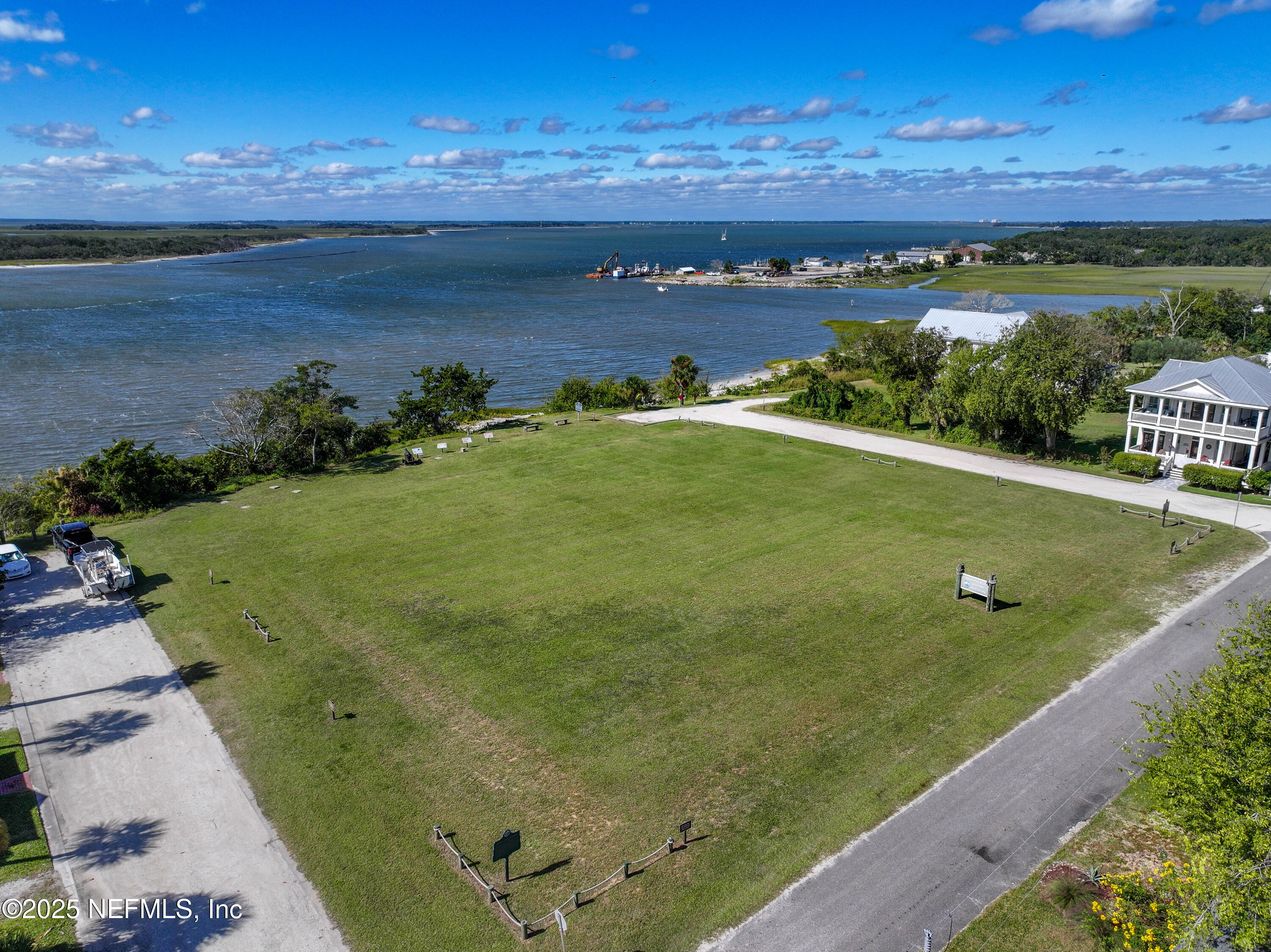 903 Someruelus Street Fernandina Beach, FL 32034 - Photo 6 of 23 a view of a lake from a yard