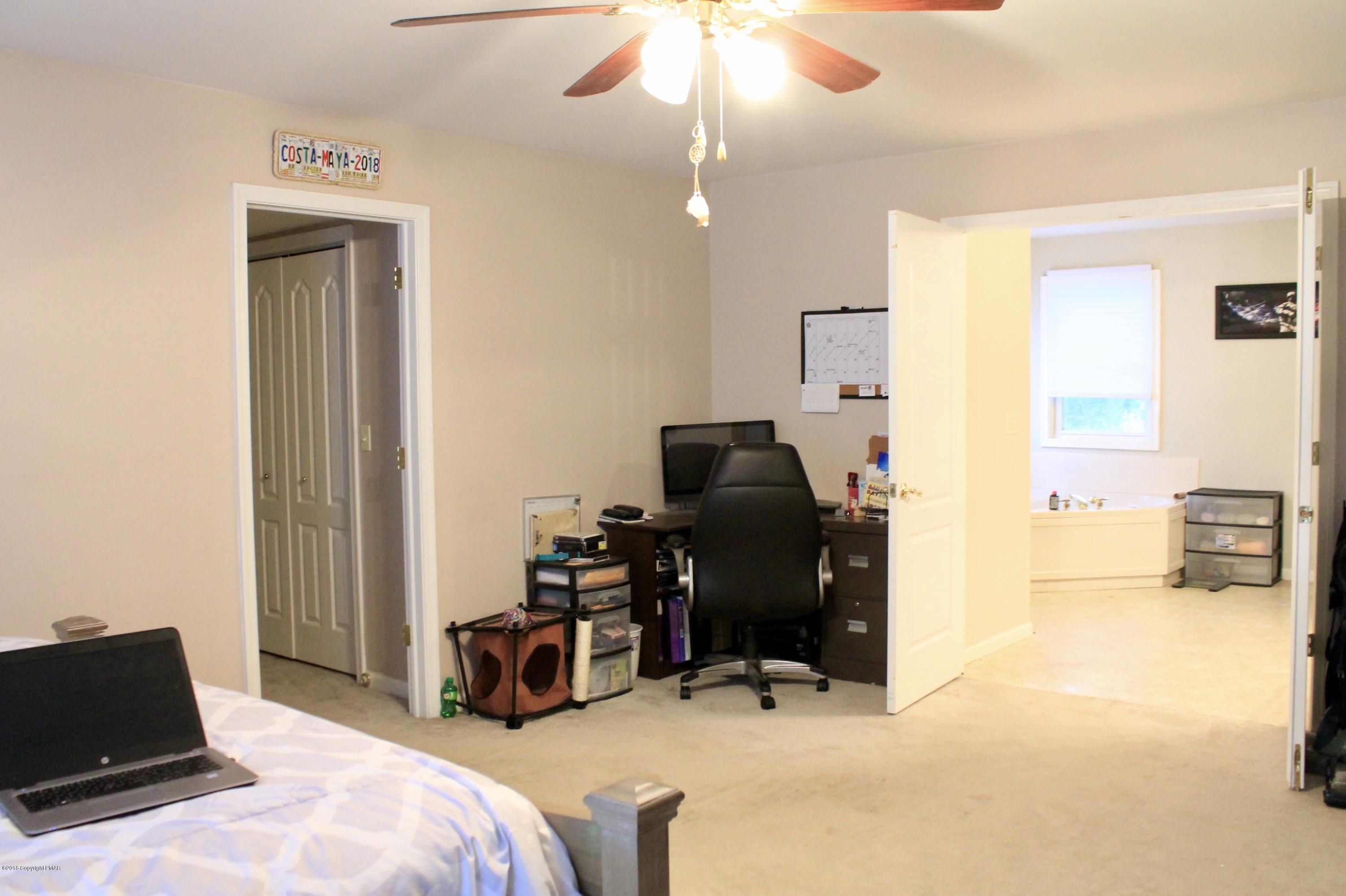 625 Balin Lane Tamiment, PA 18371 - Photo 14 of 25 Master Bedroom looking into bath suite