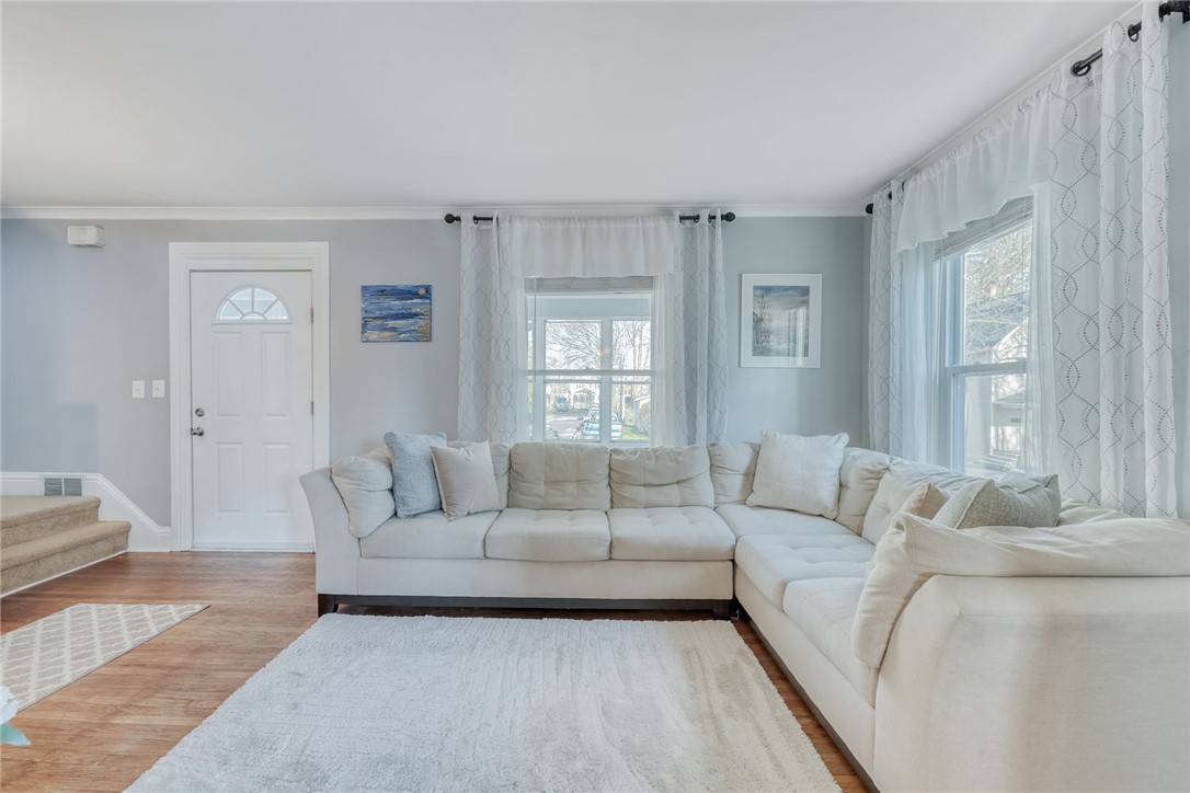 112 Middlesex Road Rochester, NY 14610 - Photo 11 of 40 FORMAL LIVING ROOM W/HARDWOODS & CROWN MOLDING