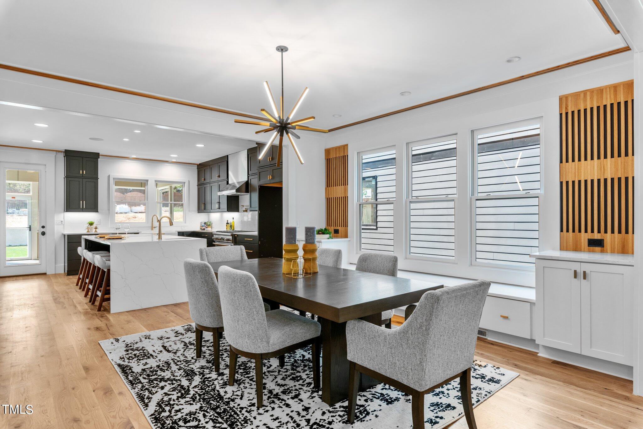 1435 Nottingham Road Raleigh, NC 27607 - Photo 12 of 48 a dining room with furniture window and wooden floor