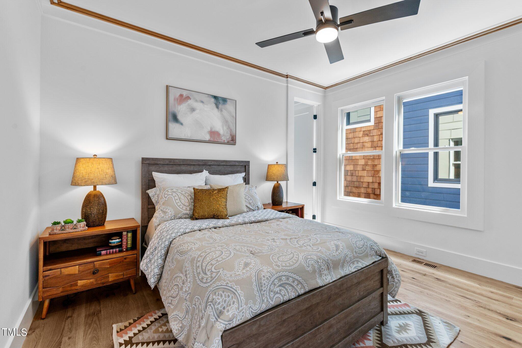 1435 Nottingham Road Raleigh, NC 27607 - Photo 19 of 48 a bedroom with bed and a window