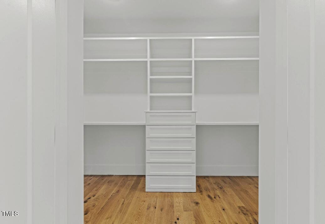 1435 Nottingham Road Raleigh, NC 27607 - Photo 25 of 48 a view of walk in closet with empty racks