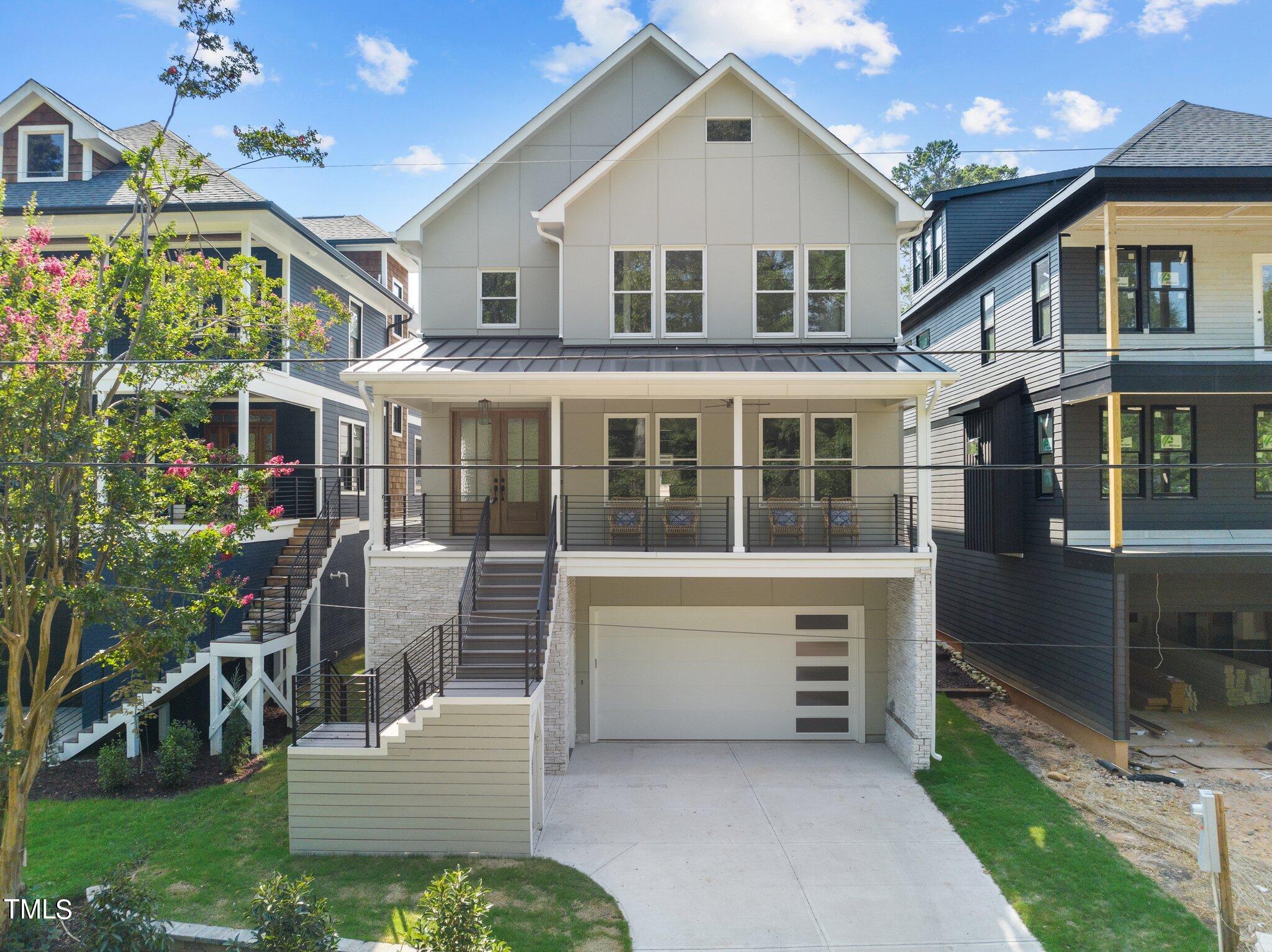 1435 Nottingham Road Raleigh, NC 27607 - Photo 3 of 48 a front view of a house with a yard