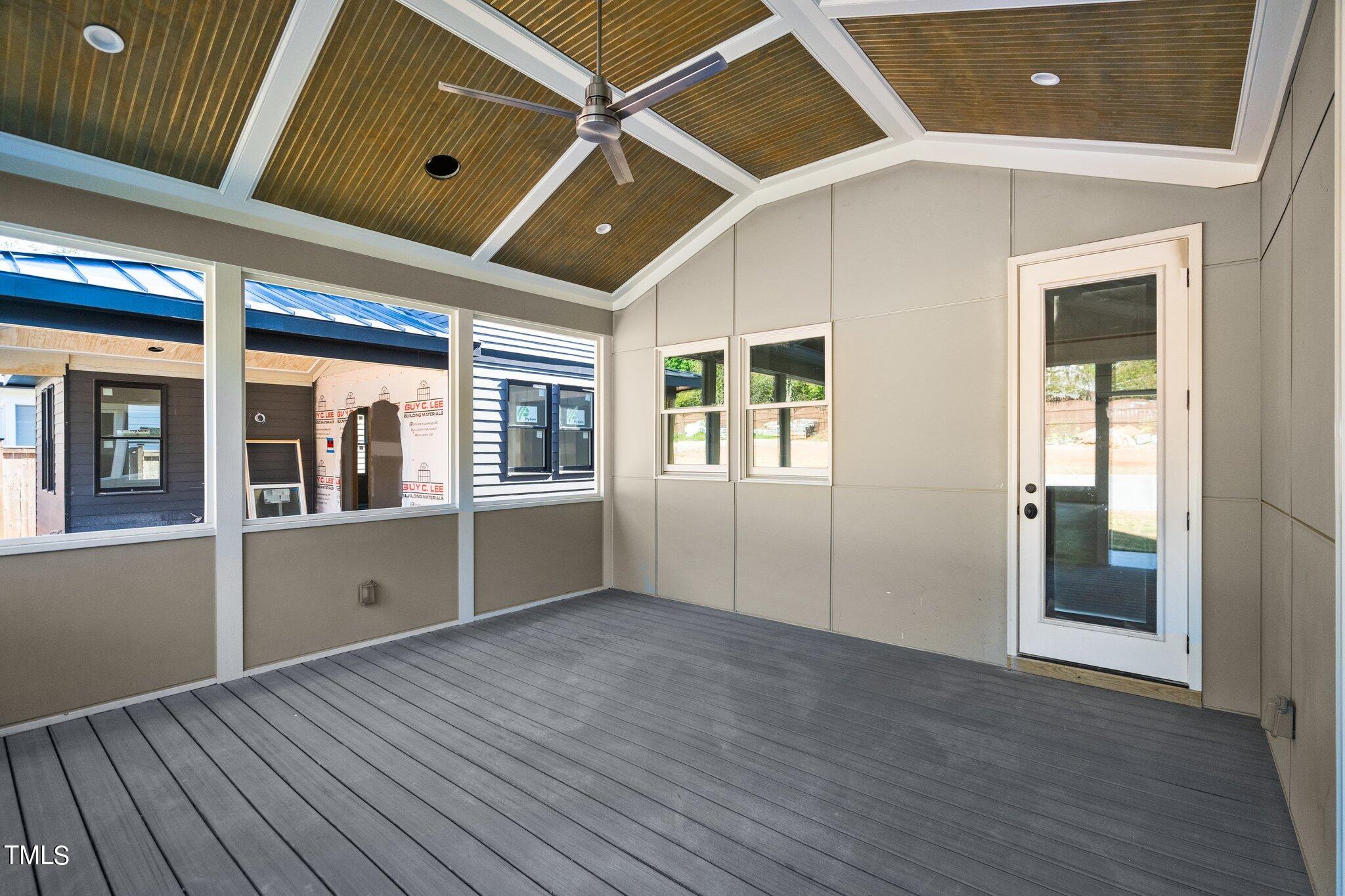 1435 Nottingham Road Raleigh, NC 27607 - Photo 33 of 48 an empty room with wooden floor and windows