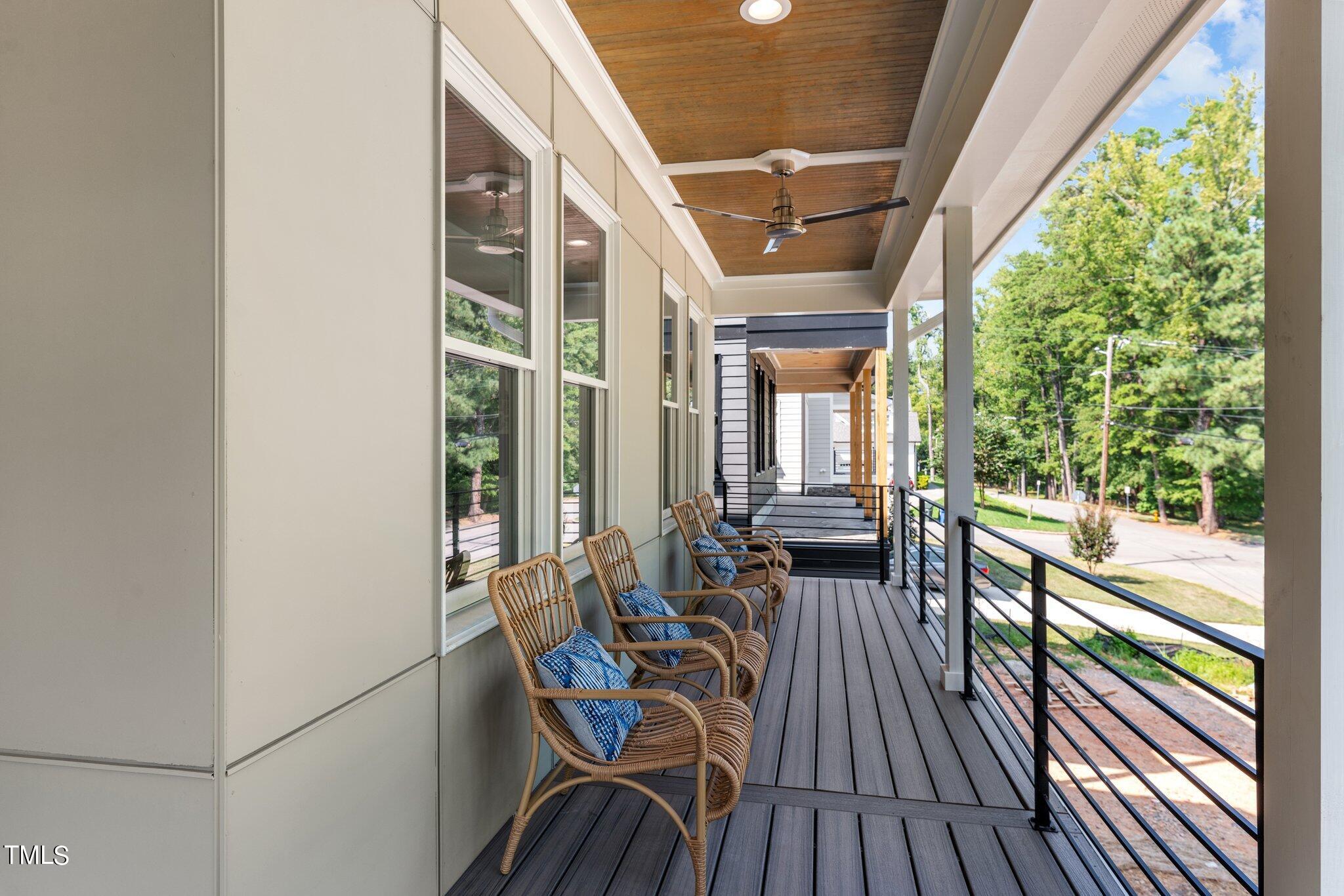 1435 Nottingham Road Raleigh, NC 27607 - Photo 6 of 48 a view of balcony with chairs and wooden floor