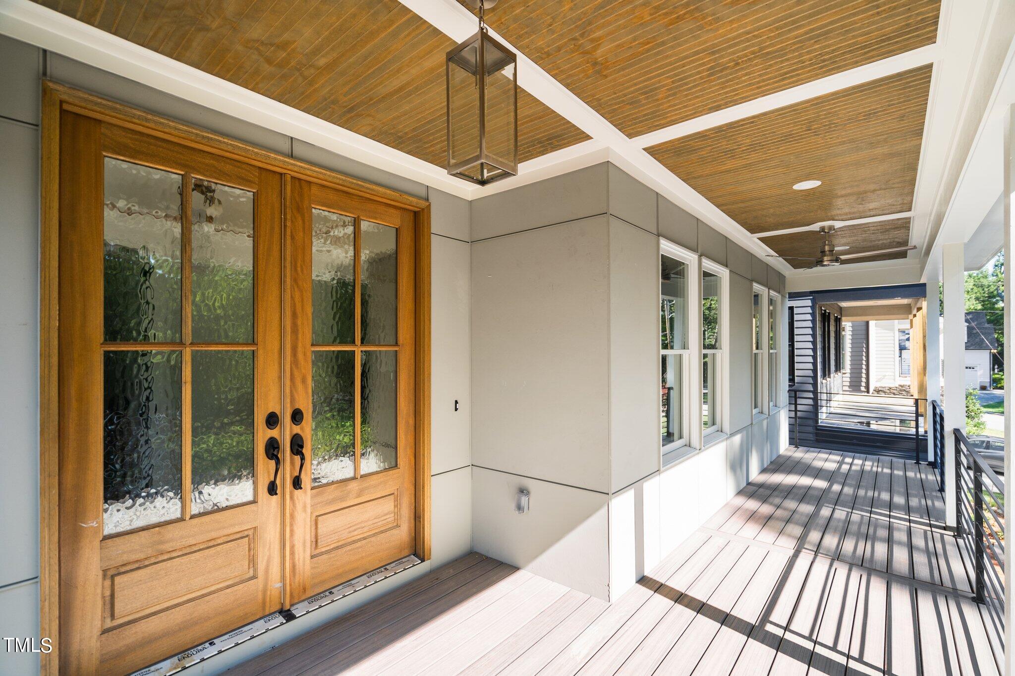 1435 Nottingham Road Raleigh, NC 27607 - Photo 7 of 48 a view of a house with a balcony
