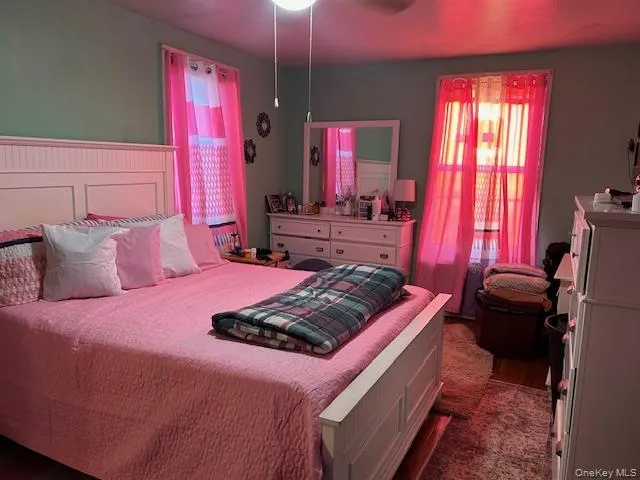 a room with furniture and flat screen tv