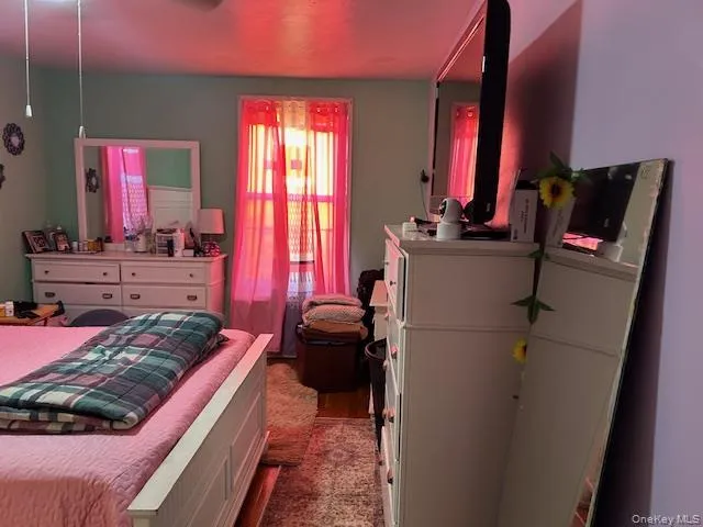 a room with furniture and wooden floor