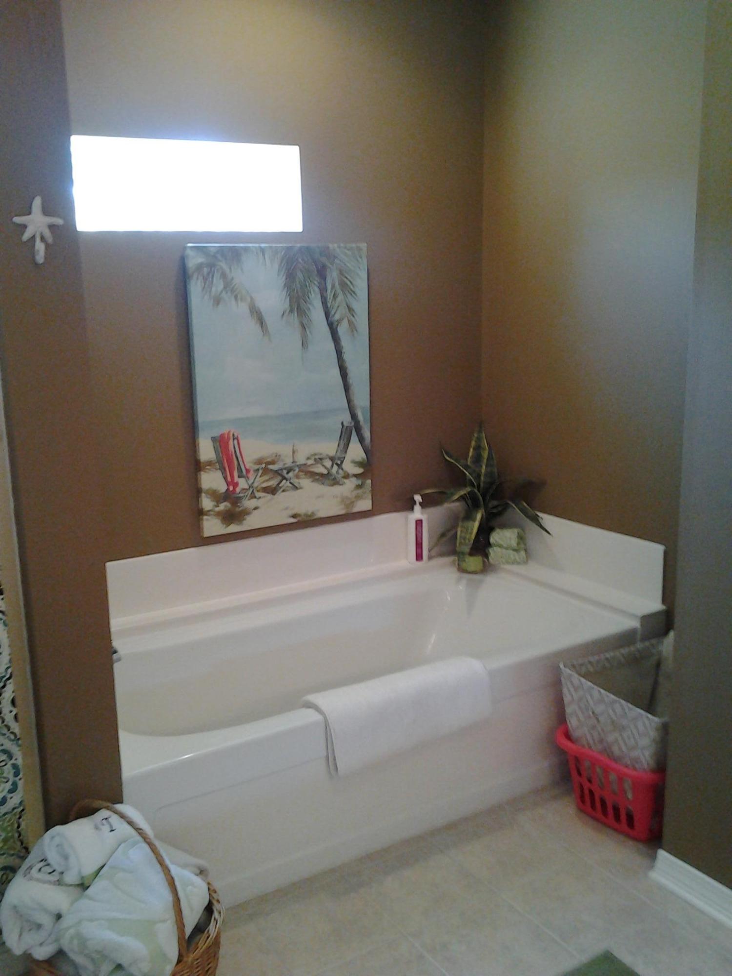 24 Vicki Street Santa Rosa Beach, FL 32459 - Photo 8 of 20 a bathroom with a tub