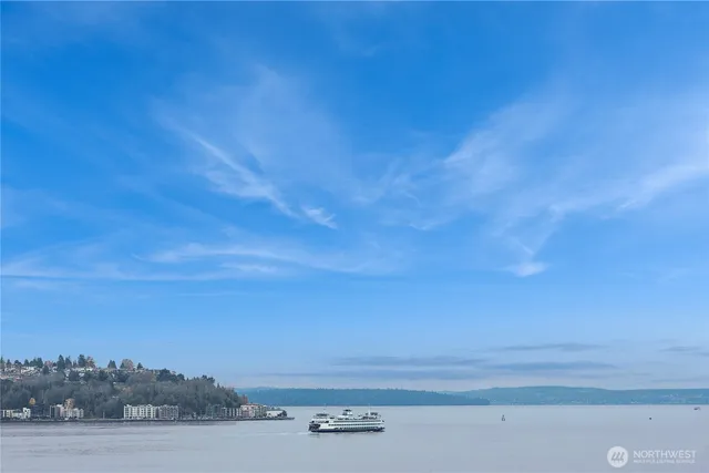 a dining room with furniture wooden floor and a rug