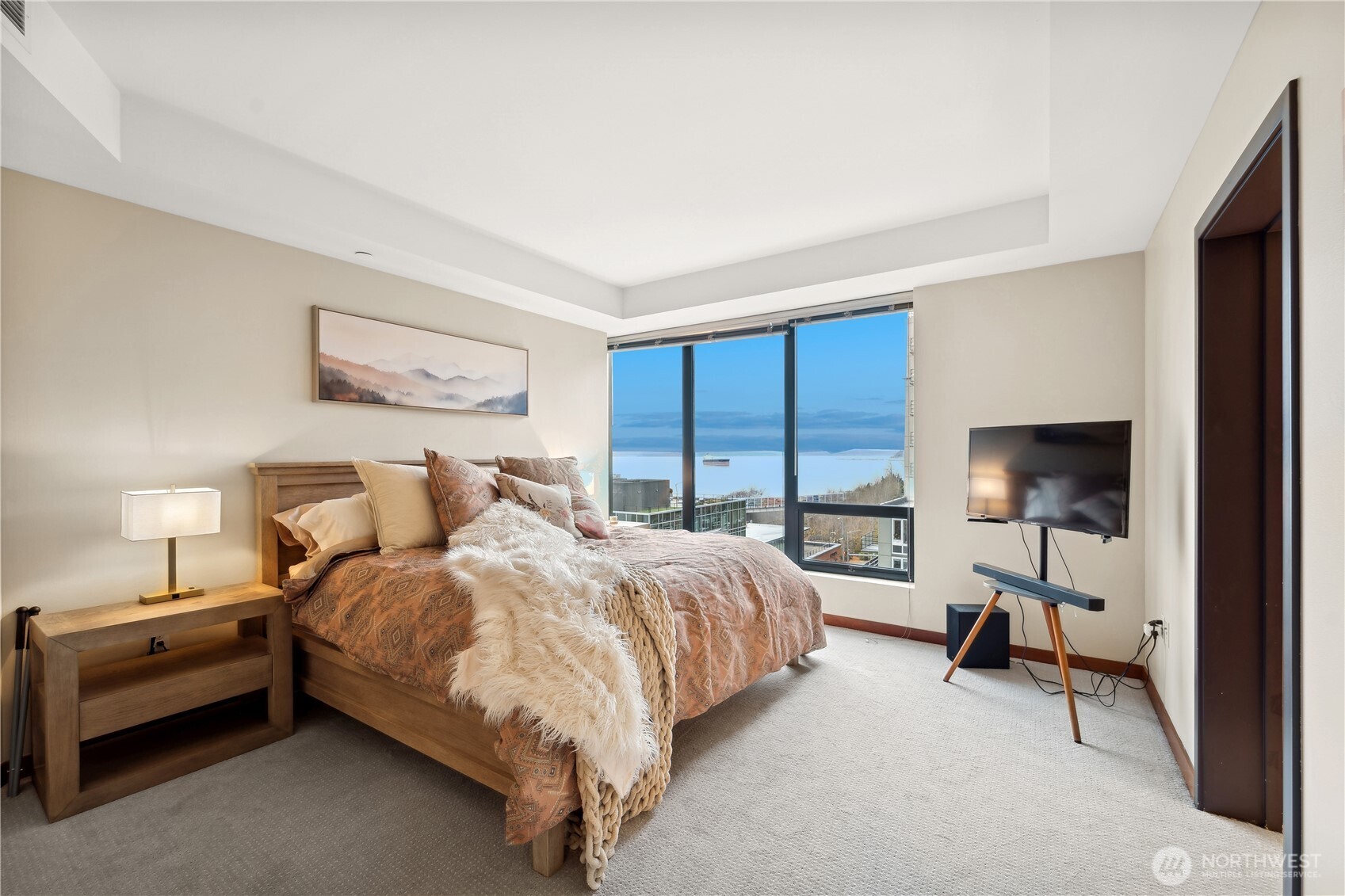 2716 Elliott Avenue, Unit 800 Seattle, WA 98121 - Photo 20 of 40 a bed room with a bed and a window