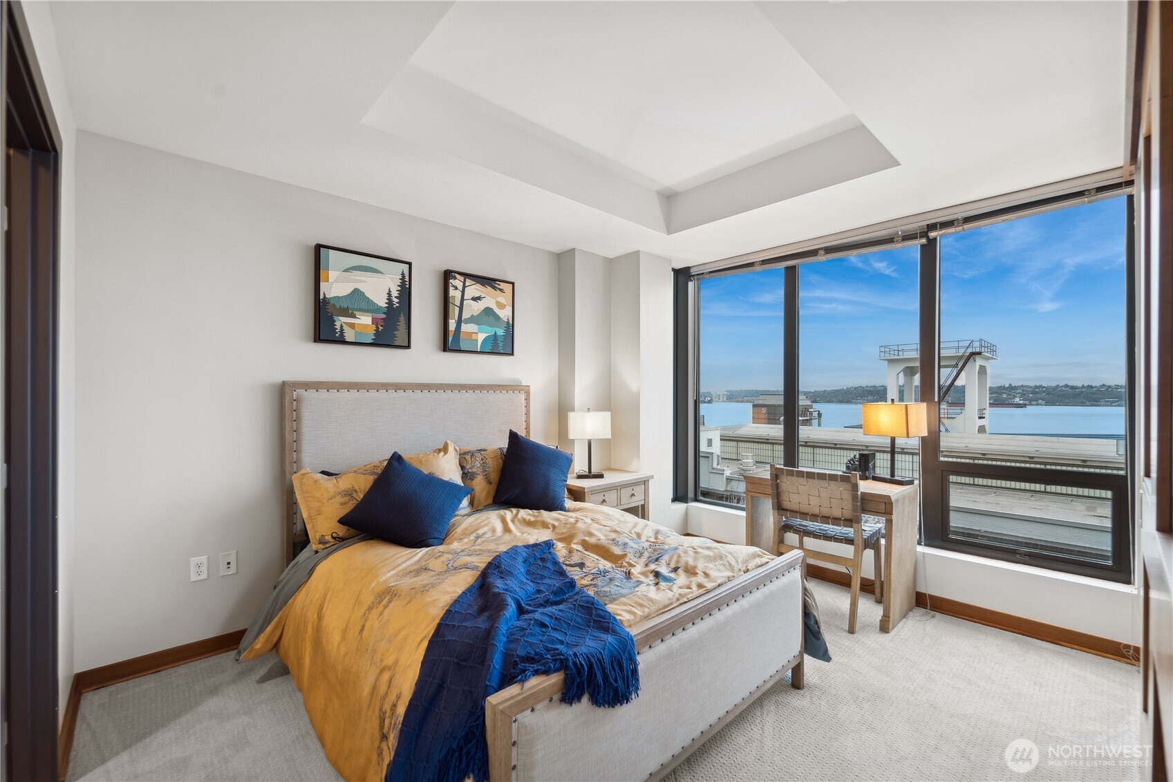 2716 Elliott Avenue, Unit 800 Seattle, WA 98121 - Photo 27 of 40 a bed room with a bed and a night stand