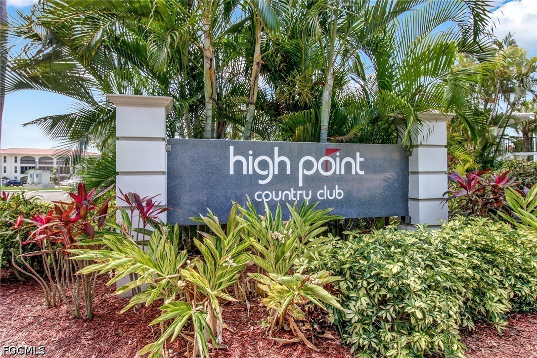 9 High Point Circle North, Unit 102 Naples, FL 34103 - Photo 37 of 48 a sign that is on a wooden wall