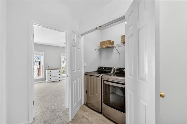 a kitchen with a stove and a refrigerator
