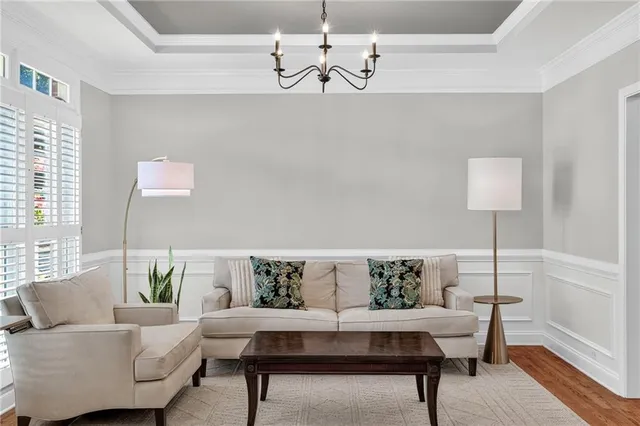 a living room with furniture and a table