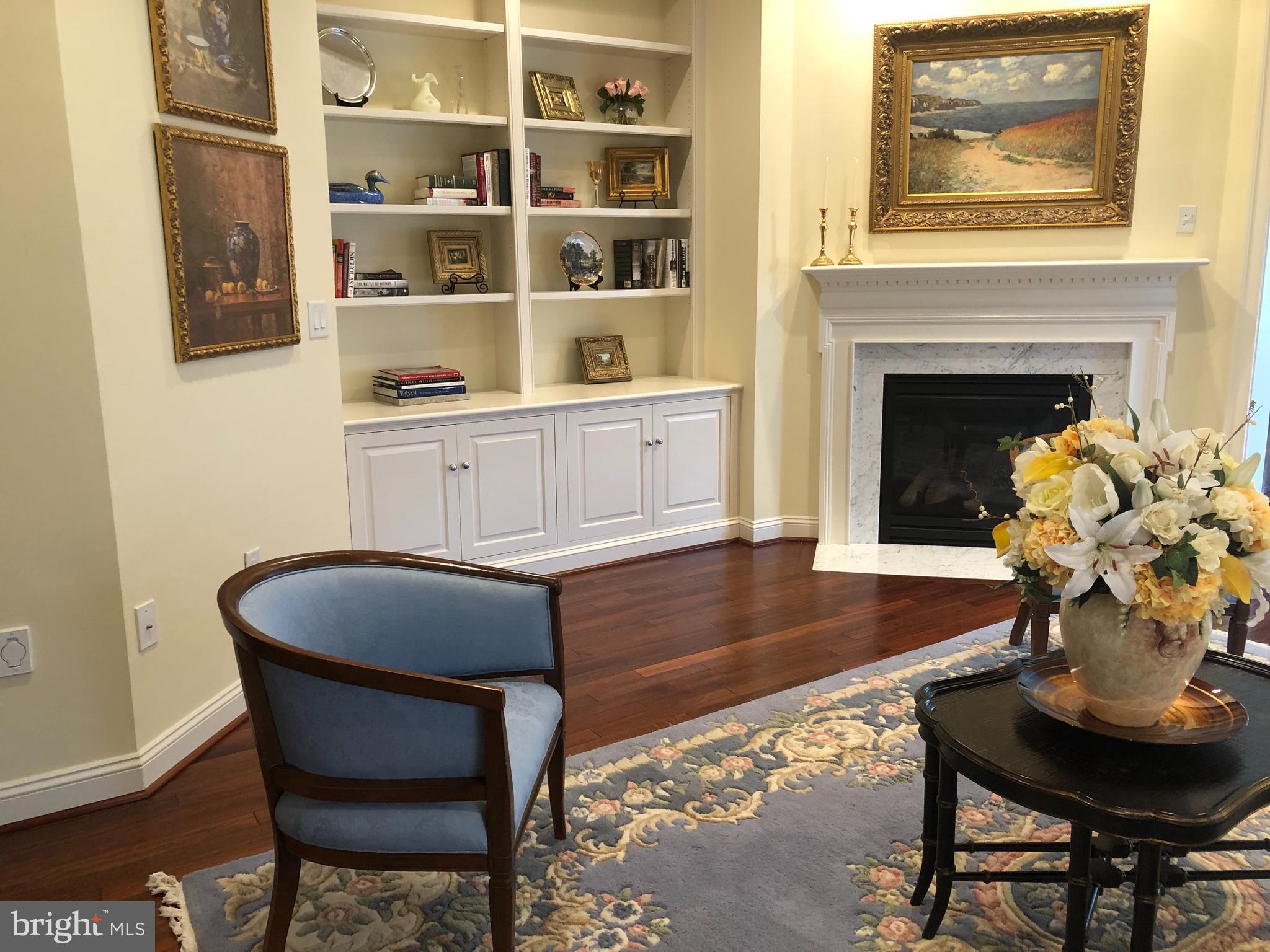2613 Commander Davis Drive Edgewater, MD 21037 - Photo 3 of 24 a dining room with furniture and a fireplace