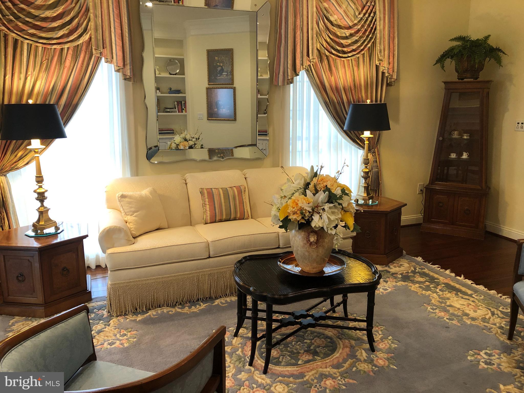 2613 Commander Davis Drive Edgewater, MD 21037 - Photo 5 of 24 a living room with furniture and a chandelier