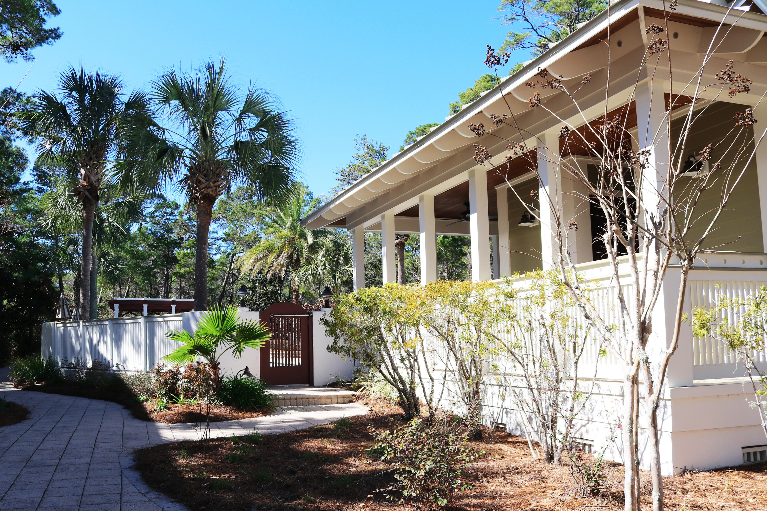 Lot 7 Dune Ridge Road Santa Rosa Beach, FL 32459 - Photo 7 of 10 a front view of a house with a garden