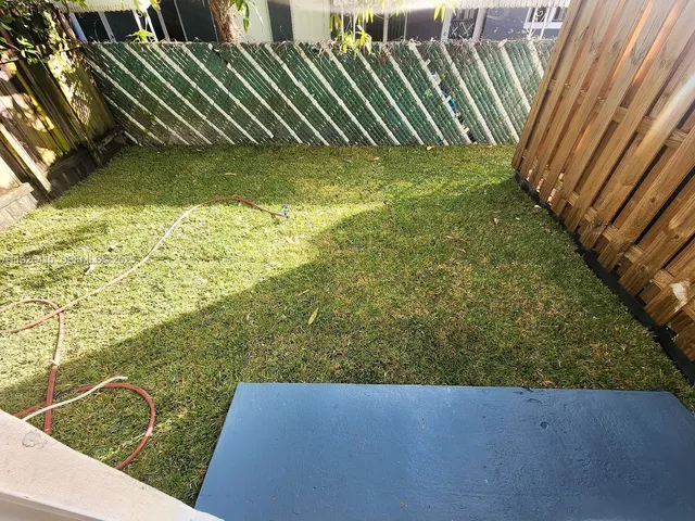 a view of swimming pool from a balcony