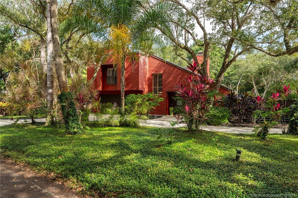 132 South River Road Stuart, FL 34996 - Photo 1 of 45 a view of a house with a yard