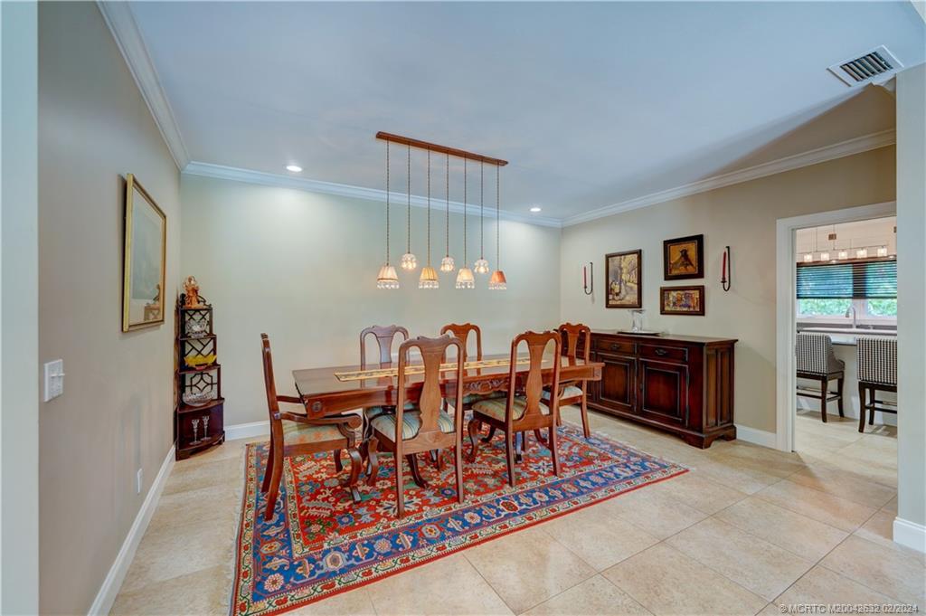132 South River Road Stuart, FL 34996 - Photo 7 of 45 a view of a dining room with furniture